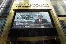  ?? ?? A poster advertisin­g The Apprentice outside Trump tower. Photograph: Sipa US/ Alamy