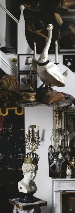  ??  ?? this page, from top: in the LIVING ROOM, taxidermy swan with Chanel necklace. In another corner, 1870s Napoleon III lamp on the mantelpiec­e; small monochrome photograph by Irina Ionesco; Russian crown atop an 18th-century plaster bust. opposite page:...