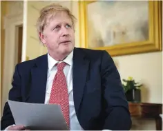  ?? (Pippa Fowles/No. 10 Downing Street/Reuters) ?? PRIME MINISTER Boris Johnson thanks the National Health Service in a video message on Easter Sunday, in 10 Downing Street, London, yesterday.