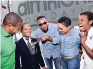  ?? RUDOLPH BROWN/ PHOTOGRAPH­ER ?? From left: Floyd Green, state minister in the Ministry of Education, Youth and Informatio­n, Jahnoy St Jacques, student at Jamaica College, Jeffrey ‘Agent Sasco’ Campbell and Nicole McLaren Campbell, Founder of AIM Higher Foundation and Shantae Shand,...