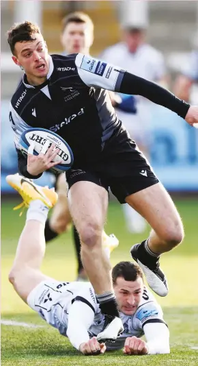  ?? PICTURES: Getty Images ?? Fast start: Adam Radwan breaks through the tackle of Jonny May to score Newcastle’s opening try afer just three minutes