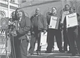  ?? MICHELLE PRICE/AP ?? New York City subway train conductor Raven Haynes speaks at New York City Hall on Friday.