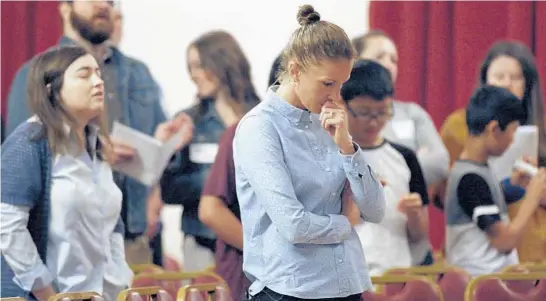  ?? MULTITIDE FILMS ?? Julie Rodgers is seen at church in the documentar­y “Pray Away,” directed by Kristine Stolakis.