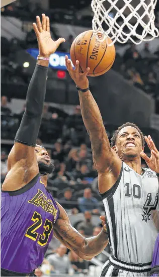  ?? Kin Man Hui / Staff photograph­er ?? DeMar DeRozan outscored LeBron James 11-4 in Friday night’s decisive fourth quarter. DeRozan finished with 36 points, nine assists, eight rebounds and two blocks.