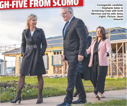  ?? Picture: Jason Edwards ?? Corangamit­e candidate Stephanie Asher in Armstrong Creek with Scott Morrison and his wife Jenny (right).