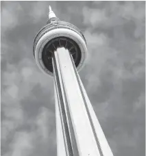  ??  ?? On June 26, Toronto’s CN Tower marked 40 years since it opened its doors — and elevators — to an awestruck public. Its observatio­n deck remains popular with tourists year-round.