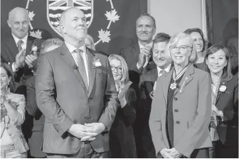  ??  ?? More than two months after the election, John Horgan officially became premier of British Columbia. He was sworn in as the 36th premier by Lt.-Gov. Judith Guichon.