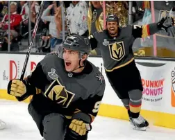  ?? AP ?? Vegas Golden Knights left wing Tomas Nosek celebrates a goal with teammate Ryan Reaves.