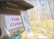  ?? Tyler Sizemore / Hearst Connecticu­t Media ?? The Department of Energy and Environmen­tal Protection announced plans to reduce capacity at popular state parks in an effort to ensure social distancing.