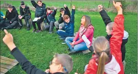  ?? ?? Sixth grade pupils take part with their teacher in a treasure hunt in Vezin, Belgium.