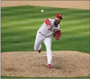  ?? MATT SLOCUM - THE ASSOCIATED PRESS ?? Archie Bradley helped the bullpen author a scoreless outing in his Phillies debut, a 3-2win over Atlanta Thursday.