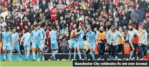  ?? ?? Manchester City celebrates its win over Arsenal