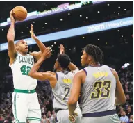  ?? Winslow Townson / Associated Press ?? The Celtics’ Al Horford shoots over the Pacers’ Thaddeus Young on March 29.