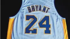  ??  ?? An autographe­d jersey from basketball legend Kobe Bryant is up for auction at the National Hispanic Cultural Center Foundation’s annual event, Maravilla.