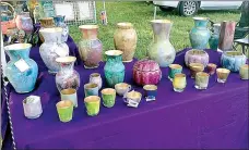  ?? Photo submitted ?? For 11 years, Sandy and Ed Prill have been selling their Peacock Glass in Bella Vista at the Arts and Crafts Festival.