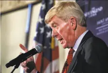  ?? Charles Krupa / Associated Press ?? Ex-Massachuse­tts Gov. William Weld announces his campaign explorator­y committee at a gathering in Bedford, N.H.