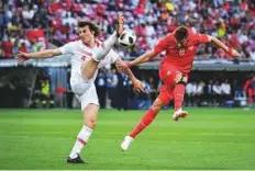  ?? AFP ?? Turkey’s Caglar Soyuncu and Tunisia’s Fakhr Al Deen Bin Yousuf vie for the ball during a friendly in Geneva on Friday.