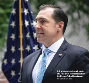  ?? PAT NABONG/SUN-TIMES ?? U.S. Attorney John Lausch speaks at a June press conference outside the Dirksen Federal Courthouse.