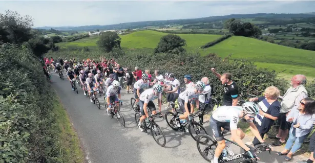  ?? Picture: David Davies ?? OVO Energy Tour of Britain riders tackle Bethlehem Hill during stage one earlier this month.