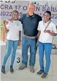  ?? ?? Preethi Kongara (left) and Jhansi Priya (right) pose with their coach Suheim Sheikh at the Asian Games Trials in Mumbai.