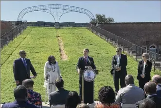  ?? WASHINGTON POST ?? Gov. Ralph Northam speaks Tuesday at Fort Monroe in Hampton, Virginia, where an arch once bore Jefferson Davis’ name. Events commemorat­ing the 400th anniversar­y of the arrival of the first Africans there will be held this month.