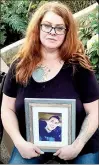  ?? CP HANDOUT PHOTO ?? Tanya Hornbuckle holds a photo of her son Joel Wolstenhol­me, who fatally overdosed at his home in Edmonton on Feb. 6, 2022.