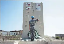  ?? PENG XI / FOR CHINA DAILY; ?? From top: On Sept 30, 2019, peacekeepe­rs come to the border between southern Lebanon and Israel to pay tribute to the martyr Du Zhaoyu who sacrificed his life for the cause of peace 13 years ago.