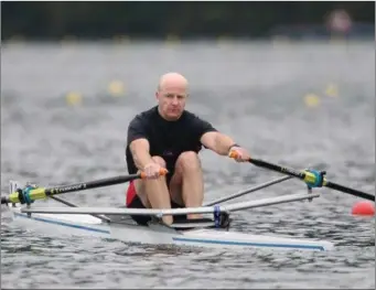  ??  ?? Tommy Colsh of Ballymote rowing for Ireland at the World Masters Rowing Championsh­ips in Slovenia.