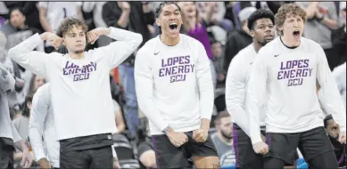  ?? Young Kwak
The Associated Press ?? Grand Canyon players on the bench react during a firstround upset of St. Mary’s in the NCAA Tournament.