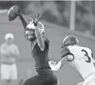  ??  ?? Norman North's Brayden Dorney celebrates after catching a touchdown pass in front of Norman's Samuel Willie.