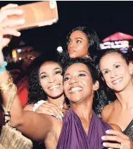  ??  ?? Patrons sharing a selfie moment at Reggae Sumfest 2017.