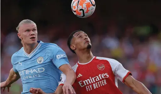  ?? ?? Arsenal defender. William Saliba nullifies Erling Haaland’s threat when the Gunners hosted Manchester City in the reverse fixture at the Emirate Stadium