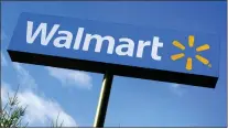  ?? CHARLES KRUPA — THE ASSOCIATED PRESS FILE ?? The nation’s largest retailer delivered full-year sales of $611.3 billion, up 6.7% compared to the prior year. But it gave cautious guidance for the next fiscal year, saying it expects sales to increase between 2.5% to 3% and U.S. sales to jump 2% to 2.5%.