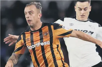  ??  ?? Hull winger Kamil Grosicki, here battling against Derby last week, is the main danger for Sunderland tomorrow