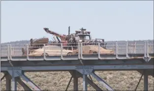  ?? File photo ?? “Terminator Salvation: The Future Begins” was filmed in Taos in 2008. Filmmakers littered the Río Grande Gorge bridge with wrecked cars to mimic the future after a nuclear explosion. The bridge was shut down intermitte­ntly during filming.