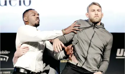  ?? AP FOTO ?? GRUDGE MATCH. Jon Jones (left) pushes Alexander Gustafsson in a UFC 232 news conference at the Madison Square Garden in New York City. Jones and Gustafsson will headline the stacked card today, Dec. 30.