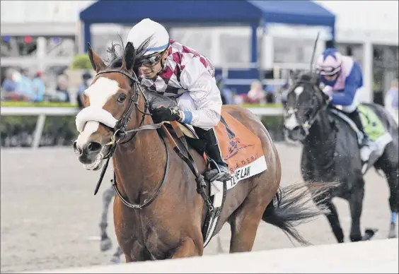  ?? Derbe Glass / Coglianese Photos, Gulfstream Park via AP ?? Tiz the Law stamped himself as a favorite for the Kentucky Derby with this victory in the Florida Derby, but must wait until September to prove it.