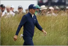  ?? THE ASSOCIATED PRESS ?? Jordan Spieth walks to the 11th tee during the first round British Open Golf Championsh­ip at Royal St George’s golf course Thursday.