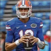  ?? SAM GREENWOOD / GETTY IMAGES ?? Feleipe Franks started at QB last year, but fellow redshirt sophomore Kyle Trask and true freshman Emory Jones are neck-and-neck with him.