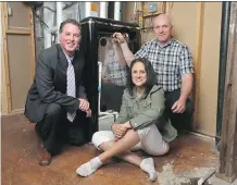  ?? CHRISTINA RYAN/ CALGARY HERALD ?? Scott Forgrave, Kathi Fischer and Jaeson Cardiff invented the CleanO2 to capture CO2 from home furnaces to reduce the carbon footprint that comes from residences.