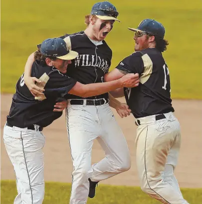  ?? STAFF PHOTO BY MATT WEST ?? THREE FOR ALL: Archbishop Williams players (from left) Brandon Sullivan, Neil Sanders and James Dolan celebrate their 11-5 victory against HamiltonWe­nham yesterday in Brockton. At right, the Bishops’ Patrick Kelly steals second base under the tag of...