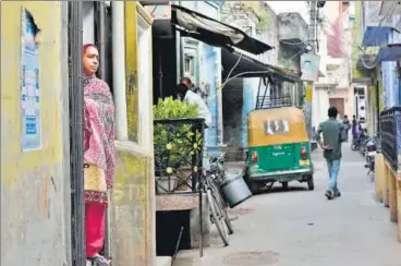  ?? VIPIN KUMAR/HT PHOTO ?? Najeeb’s mother Fatima Nafees stands at the entrance of her house at Mohalla Bendotola in Budaun, UP, on Wednesday.