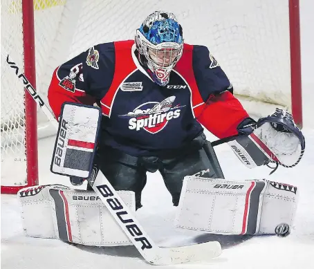  ?? DAN JANISSE ?? Spitfires goalie Michael DiPietro, who has been solid against Sarnia, will need more offence from teammates to extend the series.