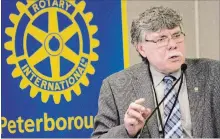  ?? JASON BAIN EXAMINER ?? Peterborou­gh County Warden J. Murray Jones addresses city Rotarians at the Holiday Inn Peterborou­gh Waterfront on Monday.