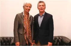  ??  ?? In this file photo taken on March 16, shows Argentina’s President Mauricio Macri (right) meets with IMF Managing Director Christine Lagarde at Olivos presidenti­al residence in Olivos, Buenos Aires. IMF chief Christine Lagarde said talks will begin ‘in...