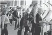  ?? JOE RAEDLE, GETTY IMAGES ?? Internatio­nal travelers arriving at the Miami airport use passport control kiosks.