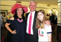  ?? NWA Democrat-Gazette/CARIN SCHOPPMEYE­R ?? Northwest Arkansas Circle of Friends President Toni Bahn and Michael Lindsey (from left) and Amelia Lindsey attend Nite at the Races on May 5.