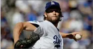  ?? AP FILE PHOTO BY JAE HONG ?? In this Oct. 17, photo, Los Angeles Dodgers starting pitcher Clayton Kershaw throws during the first inning of Game 5 in Milwaukee Brewers in Los Angeles.