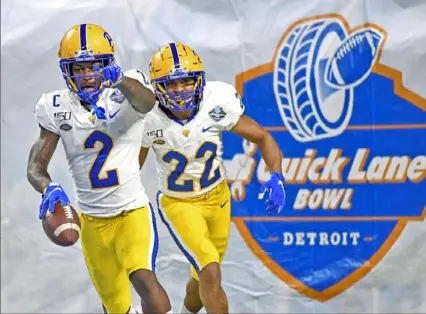  ?? Matt Freed/Post-Gazette ?? Pitt wide receiver Maurice Ffrench celebrates after a 96-yard touchdown against Eastern Michigan in the second quarter of the Quick Lane Bowl on Thursday at Ford Field in Detroit. Coverage in Sports,