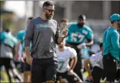  ?? ALLEN EYESTONE / PALM BEACH POST ?? Dolphins defensive coordinato­r Matt Burke, seen at training camp last week, said he doesn’t want “guys leading with their heads.”